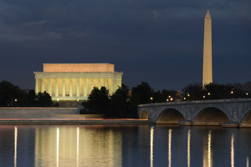 Lincoln Memorial and Washington Monument at night. A night view from riverside of the Potomac River - Washington DC, United States