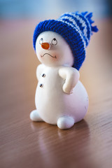 Cute Snowman on Wooden Table