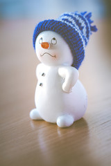 Cute Snowman on Wooden Table