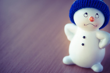 Cute Snowman on Wooden Table