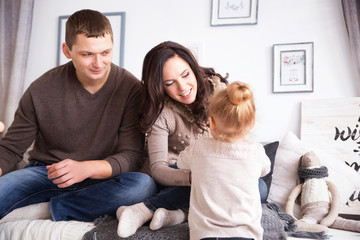 Mother, father and daughter. Portrait of happy family