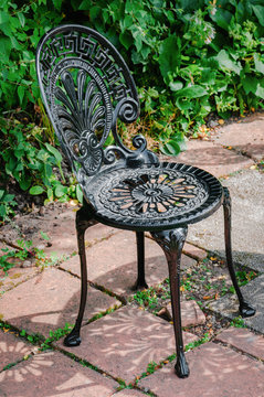 Wrought Cast Iron Chair In The Garden Black Color