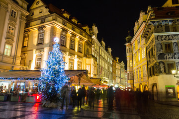 Fototapeta na wymiar Christmas market at central square in deep evening. Prague, Europe.