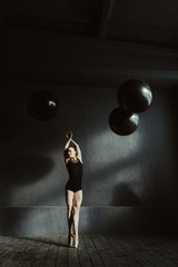 Graceful ballet dancer expressing elegance in the studio