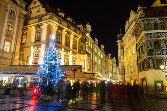 Christmas market at central square in deep evening. Prague, Europe.
