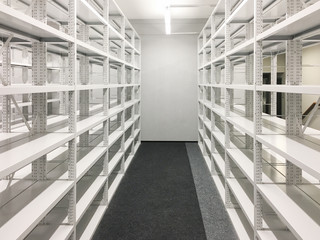 empty bookshelves in public library