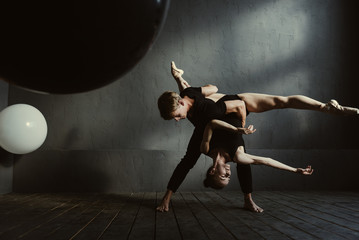 Flexible ballet dancers showing their skills