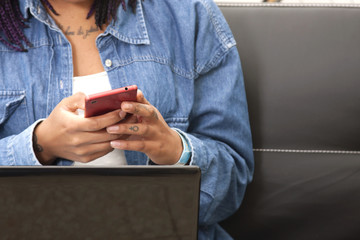 hands of female young with the phone mobile, closeup