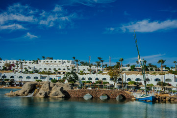 white houses in red sea situated on the beach in tropical location