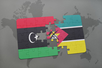 puzzle with the national flag of libya and mozambique on a world map