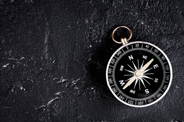 compass on dark background concept - direction motion top view © 279photo
