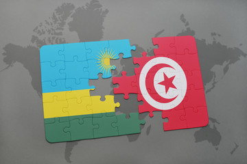 puzzle with the national flag of rwanda and tunisia on a world map