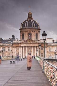 Morning commuters on the Pont Des Arts, Paris, France