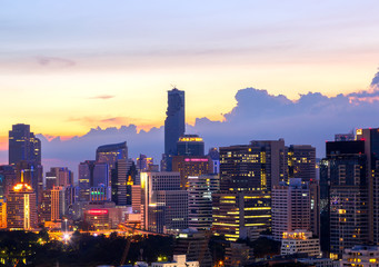 View of modern office buildings, condominium in big city downtown with sunset sky