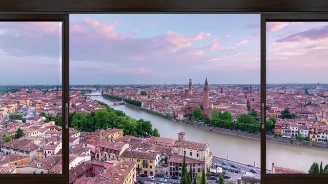 verona skyline panoramic view timelapse from day to night seen through sliding window