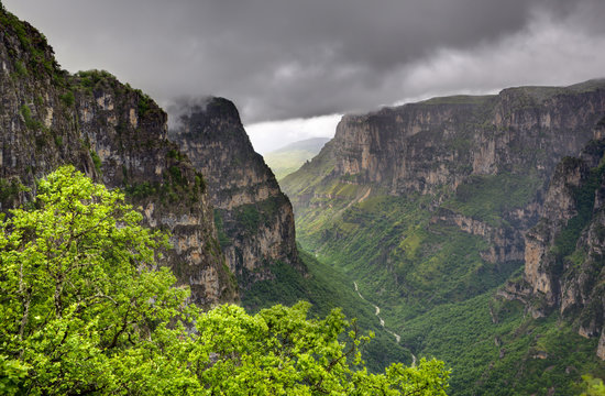Rain and cloud over the Vikos Gorge from the Oxia viewpoint, Zagoria, Epirus, Greece