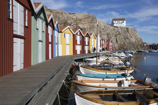 Traditional falu red fishermen's houses in harbour, Smogen, Bohuslan Coast, Southwest Sweden, Sweden
