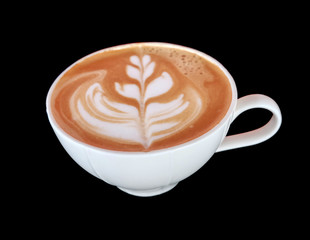 Cup of art latte or cappuccino coffee isolated on black.