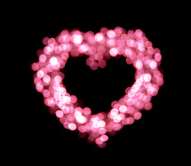 Pink bokeh heart shapes background.