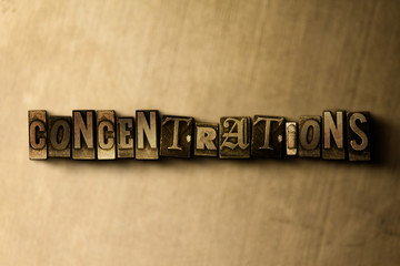 CONCENTRATIONS - close-up of grungy vintage typeset word on metal backdrop. Royalty free stock illustration.  Can be used for online banner ads and direct mail.