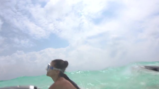 POV Shot Of Best Friends Enjoying Water Sports