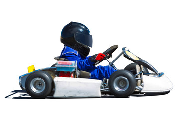 Young kid racing a go cart around a track. Panned to show speed.