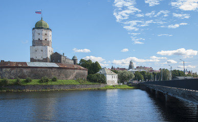 Fototapeta na wymiar Vyborg castle from the embankment, tower of St. Olav