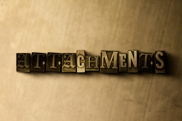 Naklejka premium ATTACHMENTS - close-up of grungy vintage typeset word on metal backdrop. Royalty free stock illustration. Can be used for online banner ads and direct mail.