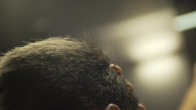 Close Up Of Man Blow Drying His Hair