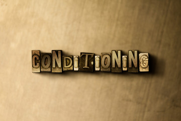 CONDITIONING - close-up of grungy vintage typeset word on metal backdrop. Royalty free stock illustration.  Can be used for online banner ads and direct mail.