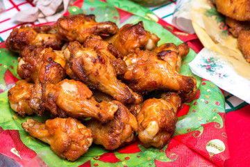 fried upper chicken wings on the dinner table.