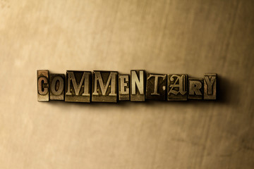 COMMENTARY - close-up of grungy vintage typeset word on metal backdrop. Royalty free stock illustration.  Can be used for online banner ads and direct mail.