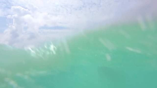 Young Woman Enjoys Riding Small Jet In Tropical Sea