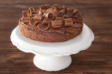 Delicious chocolate cake on stand