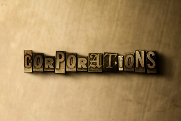 CORPORATIONS - close-up of grungy vintage typeset word on metal backdrop. Royalty free stock illustration.  Can be used for online banner ads and direct mail.