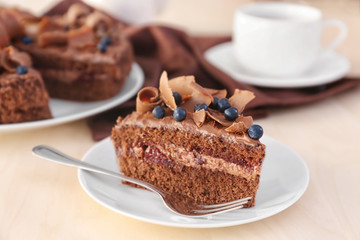 Delicious chocolate cake with blueberry on plate