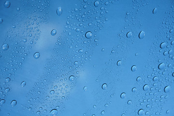 Naklejka na ściany i meble rain drop on glass background, pattern for design