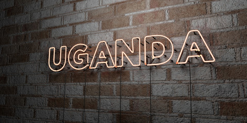 UGANDA - Glowing Neon Sign on stonework wall - 3D rendered royalty free stock illustration.  Can be used for online banner ads and direct mailers..
