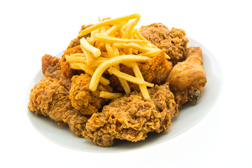 Fried chicken and french fries in white plate