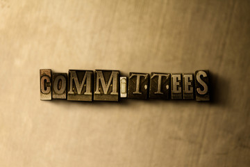 COMMITTEES - close-up of grungy vintage typeset word on metal backdrop. Royalty free stock...