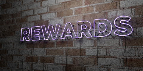 REWARDS - Glowing Neon Sign on stonework wall - 3D rendered royalty free stock illustration.  Can be used for online banner ads and direct mailers..
