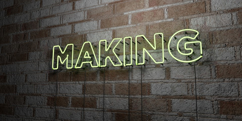 Fototapeta na wymiar MAKING - Glowing Neon Sign on stonework wall - 3D rendered royalty free stock illustration. Can be used for online banner ads and direct mailers..