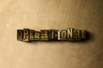 OPERATIONAL - close-up of grungy vintage typeset word on metal backdrop. Royalty free stock illustration.  Can be used for online banner ads and direct mail.