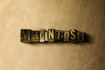 MACINTOSH - close-up of grungy vintage typeset word on metal backdrop. Royalty free stock illustration.  Can be used for online banner ads and direct mail.