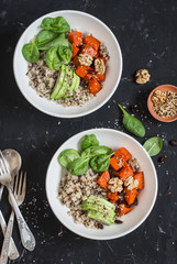 Quinoa and pumpkin bowl. Vegetarian, healthy, diet food. On a dark background, top view