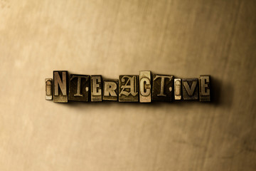 Obraz premium INTERACTIVE - close-up of grungy vintage typeset word on metal backdrop. Royalty free stock illustration. Can be used for online banner ads and direct mail.