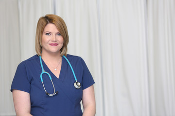 Portrait of a young attractive female healthcare professional, woman nurse