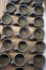 group of clay cups