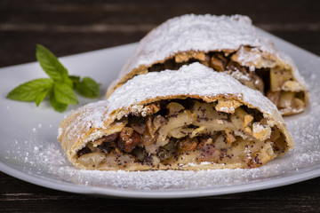 Slice of an apple strudel on a plate