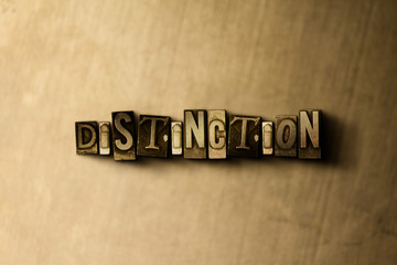 Naklejka premium DISTINCTION - close-up of grungy vintage typeset word on metal backdrop. Royalty free stock illustration. Can be used for online banner ads and direct mail.